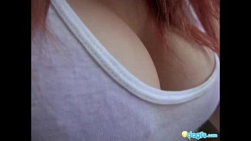 Busty redhead masturbates